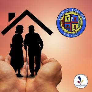 Silhouettes of two people under a roof in cupped hands with the Town of Colonie seal