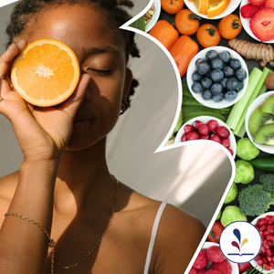 Woman holding orange slice over her eye; healthy foods in the background