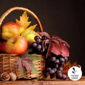 Basket of fruit, fall leaves