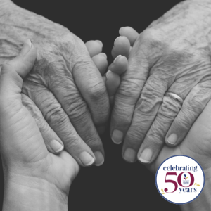 Young hands holding older hands