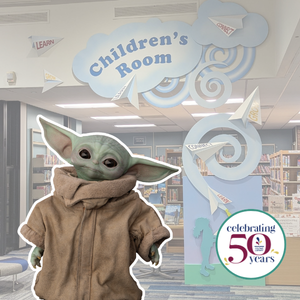 Baby Yoda with Colonie Library Children's Room in background