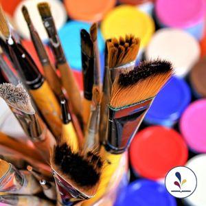 Paint brushes and colorful paints